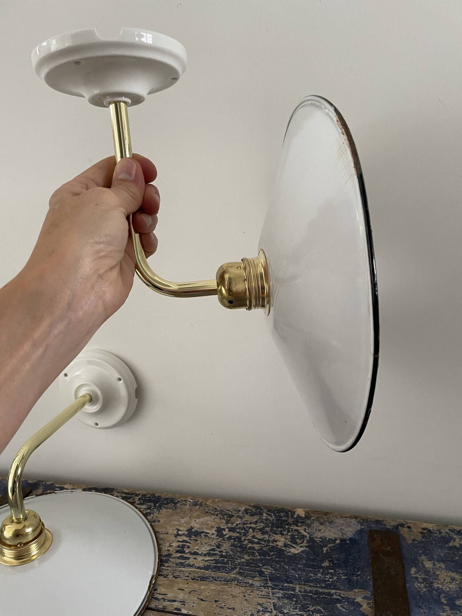 Pair of vintage wall lamps in enamelled sheet metal electrified to nine