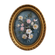 Cadre ovale en verre bombé et décor de fleurs