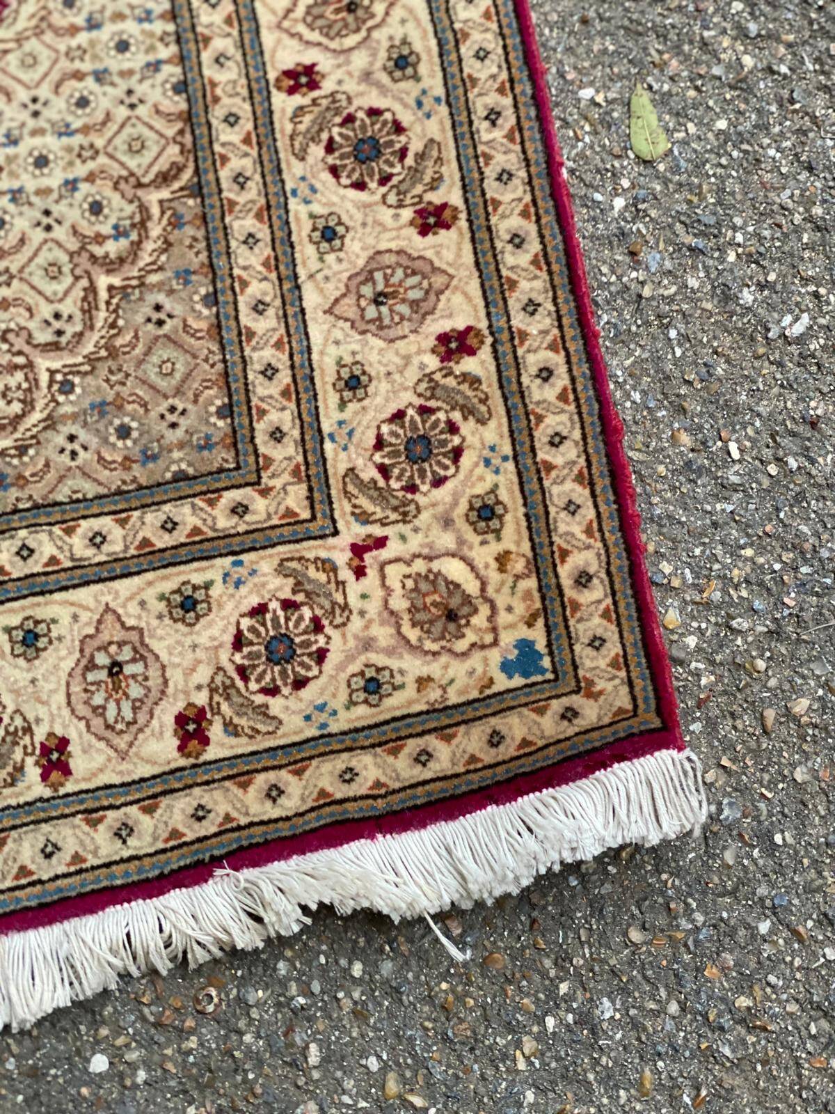 Handmade burgundy wool Persian rug 100x155cm