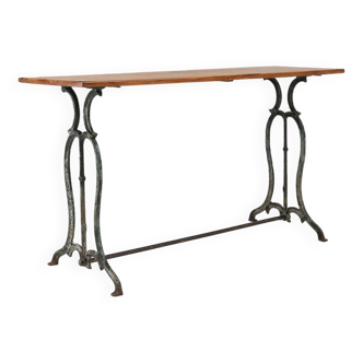 French bistro table with elegant metal base and oak top, ca. 1890
