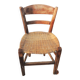 Old woven straw children's chair