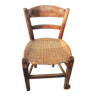 Old woven straw children's chair