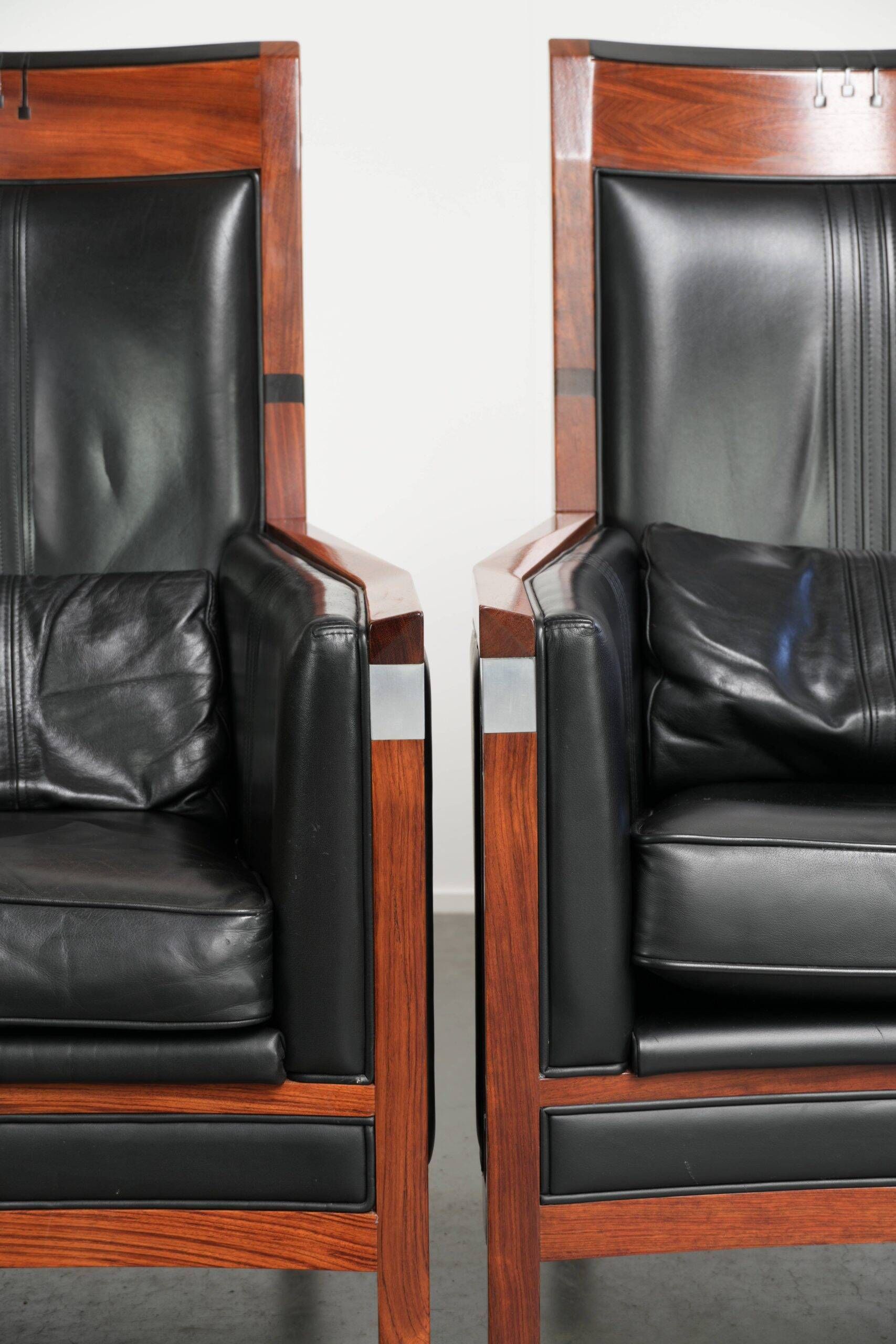 Set of 2 Art Deco design armchairs in black cowhide leather
