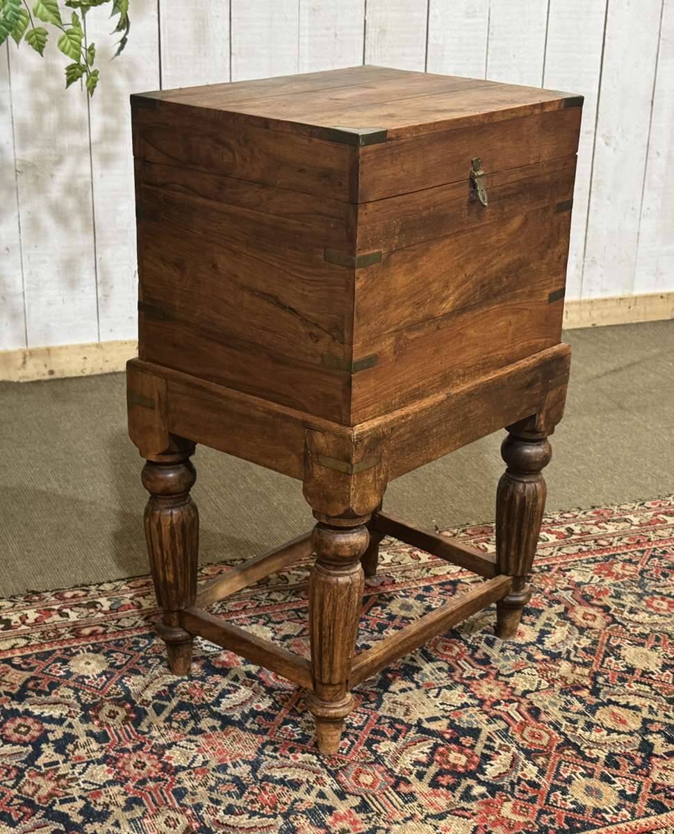Teak bottle cabinet on legs in marine style