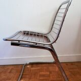 2 chrome wired chairs