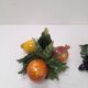 Pair of fruit candle holders in Italian majolica.