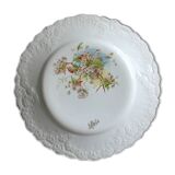 Antique earthenware plate with cherry blossom decoration