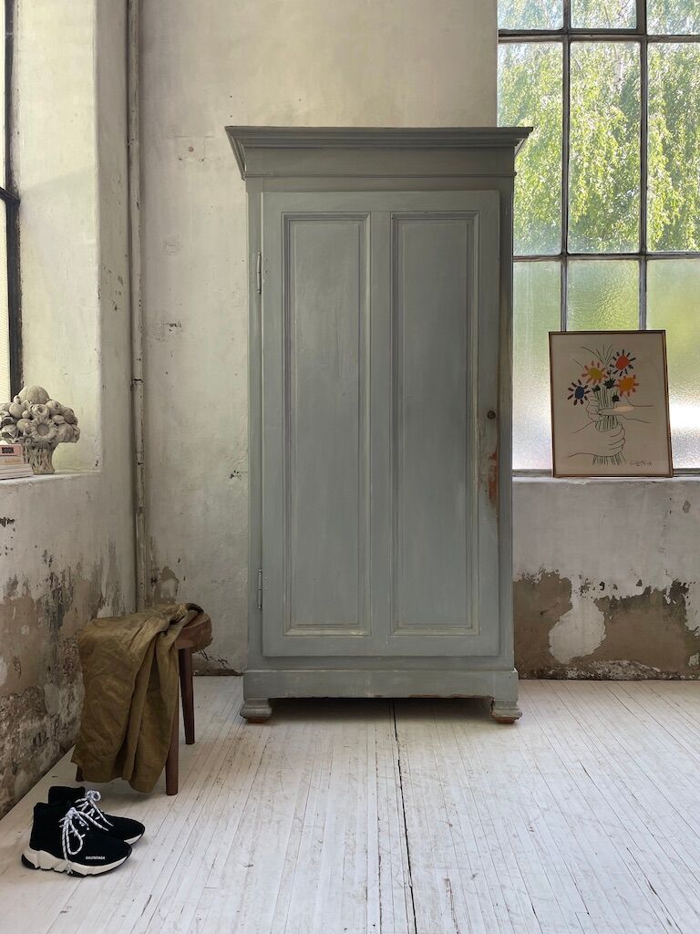 Blue patinated cap cabinet