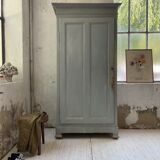 Blue patinated cap cabinet