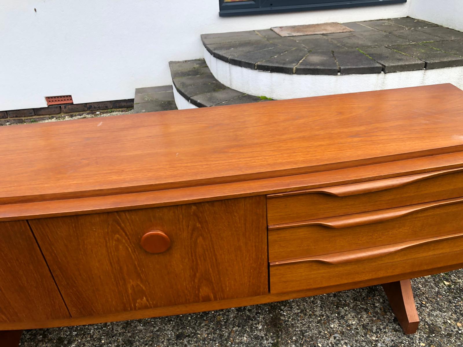Scandinavian-style english line in teak