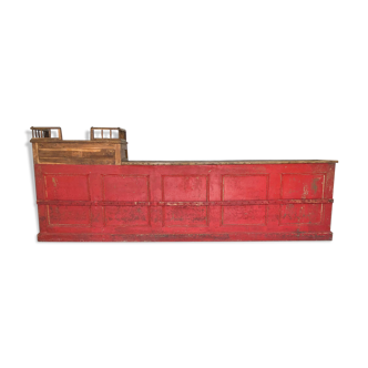 Former red patina and oak tray trading counter