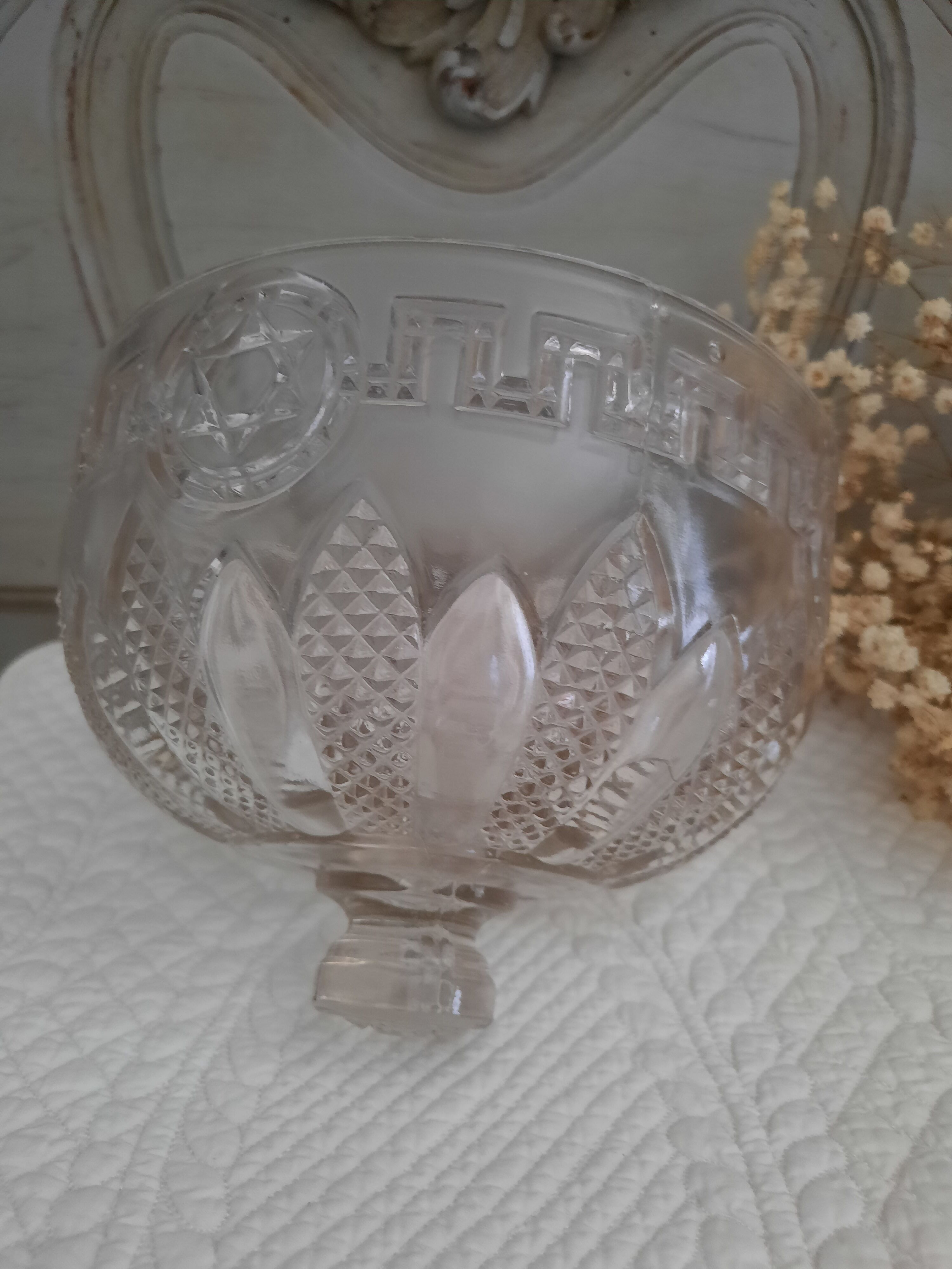 Chiseled glass bell on its dish