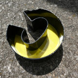 Letter C of yellow and black industrial sign