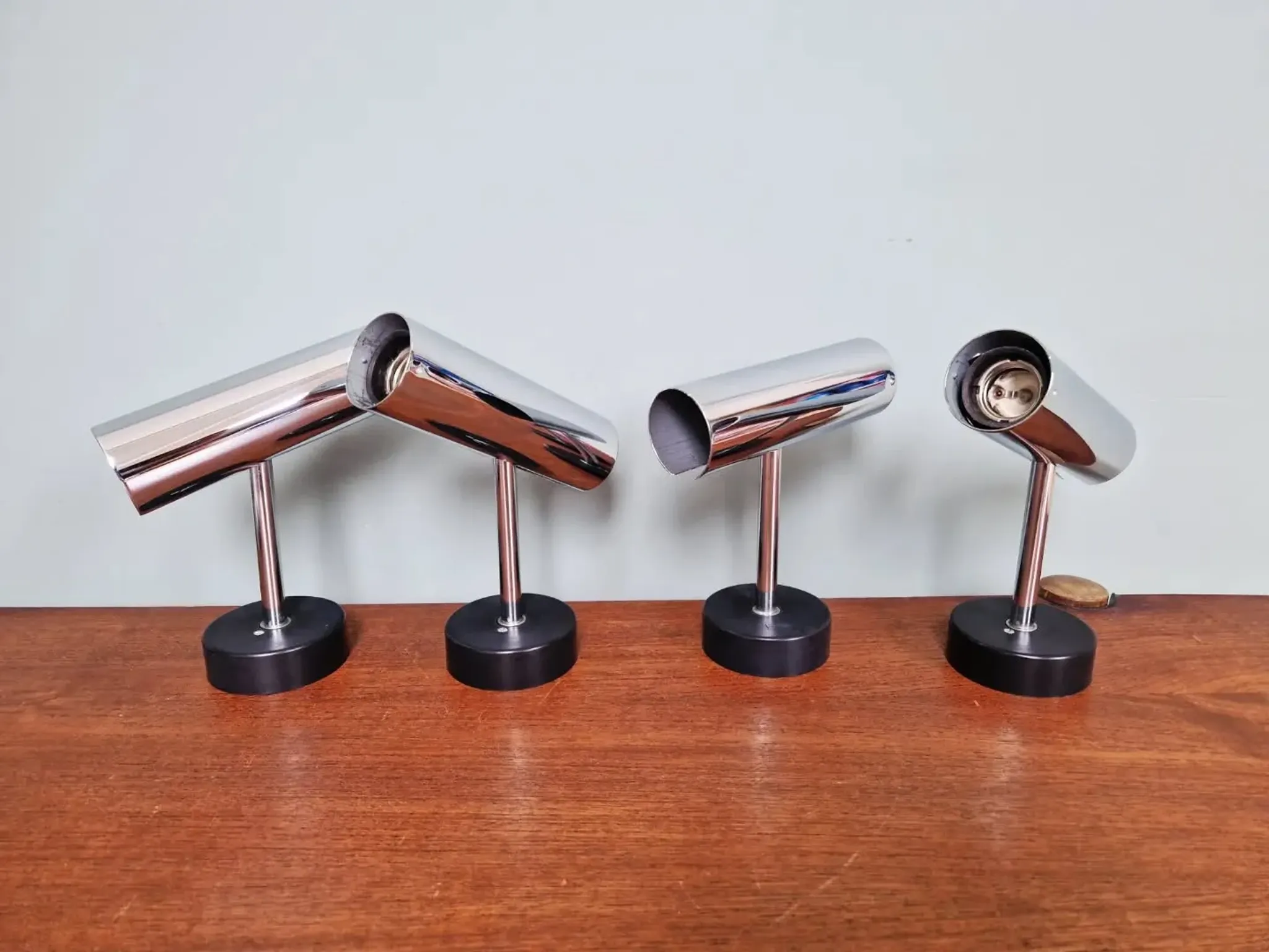 Pair of chrome metal wall lights, Staff Leuchten, Germany, 1970.