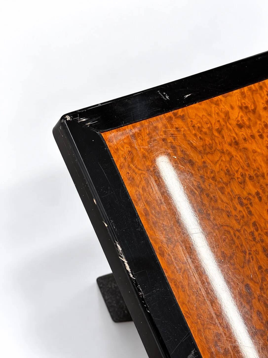 Vintage coffee table in wood burl and black lacquer, geometric inlay.