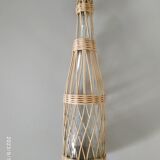 Glass and rattan bottle