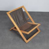 Modernist folding lounge chair with wooden frame, 1970s
