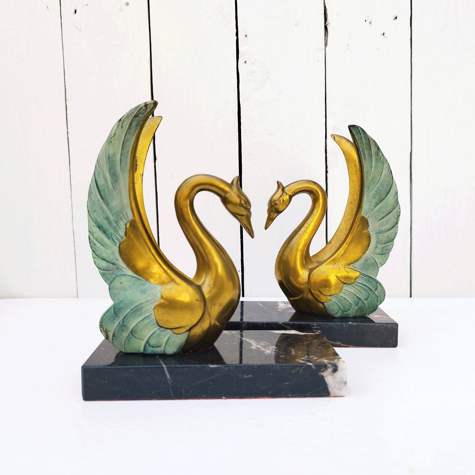 Pair of art deco golden swan bookends