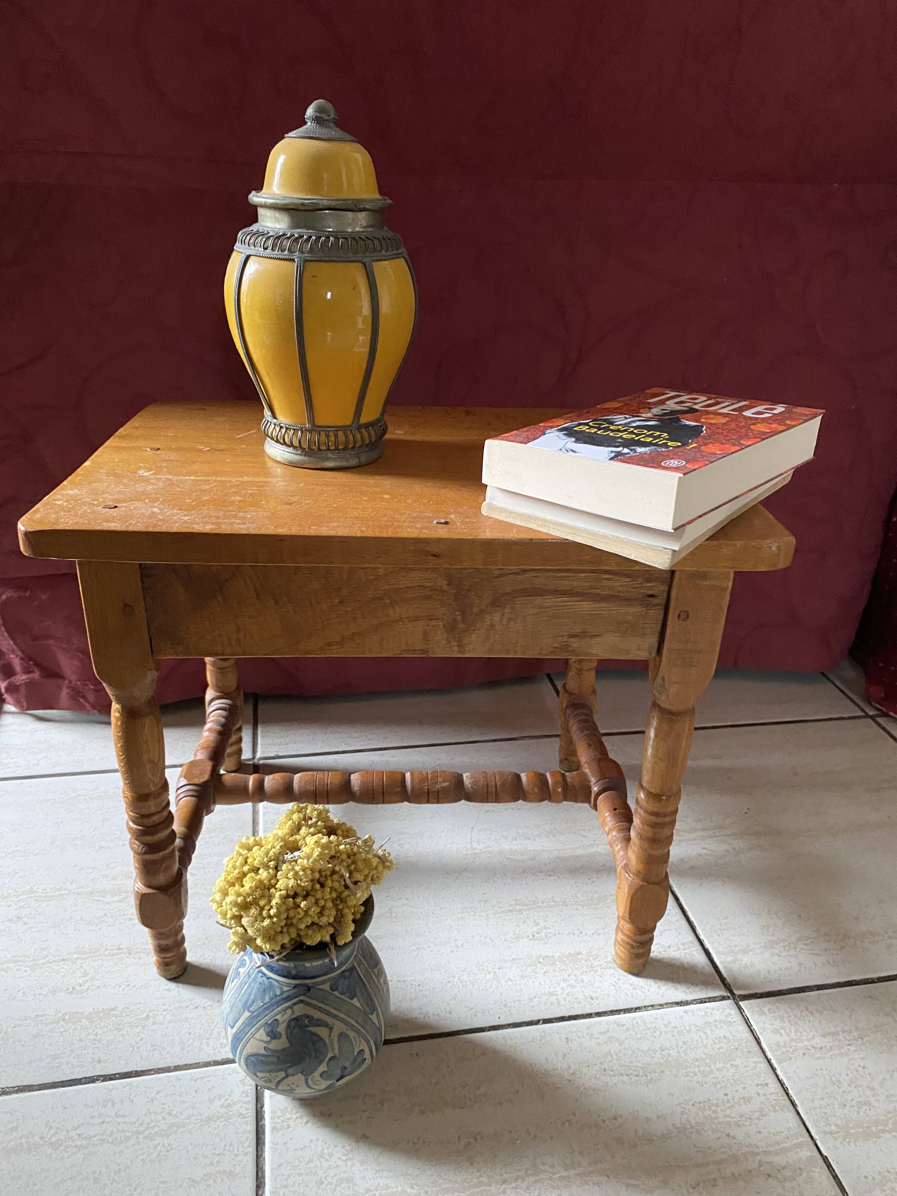 Small footrest bench in bohemian style.