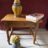 Small footrest bench in bohemian style.