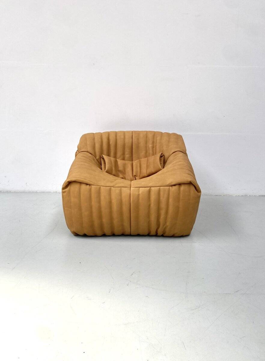 Sandra chair in camel leather by Annie Hiéronimus for Cinna/Ligne Roset.