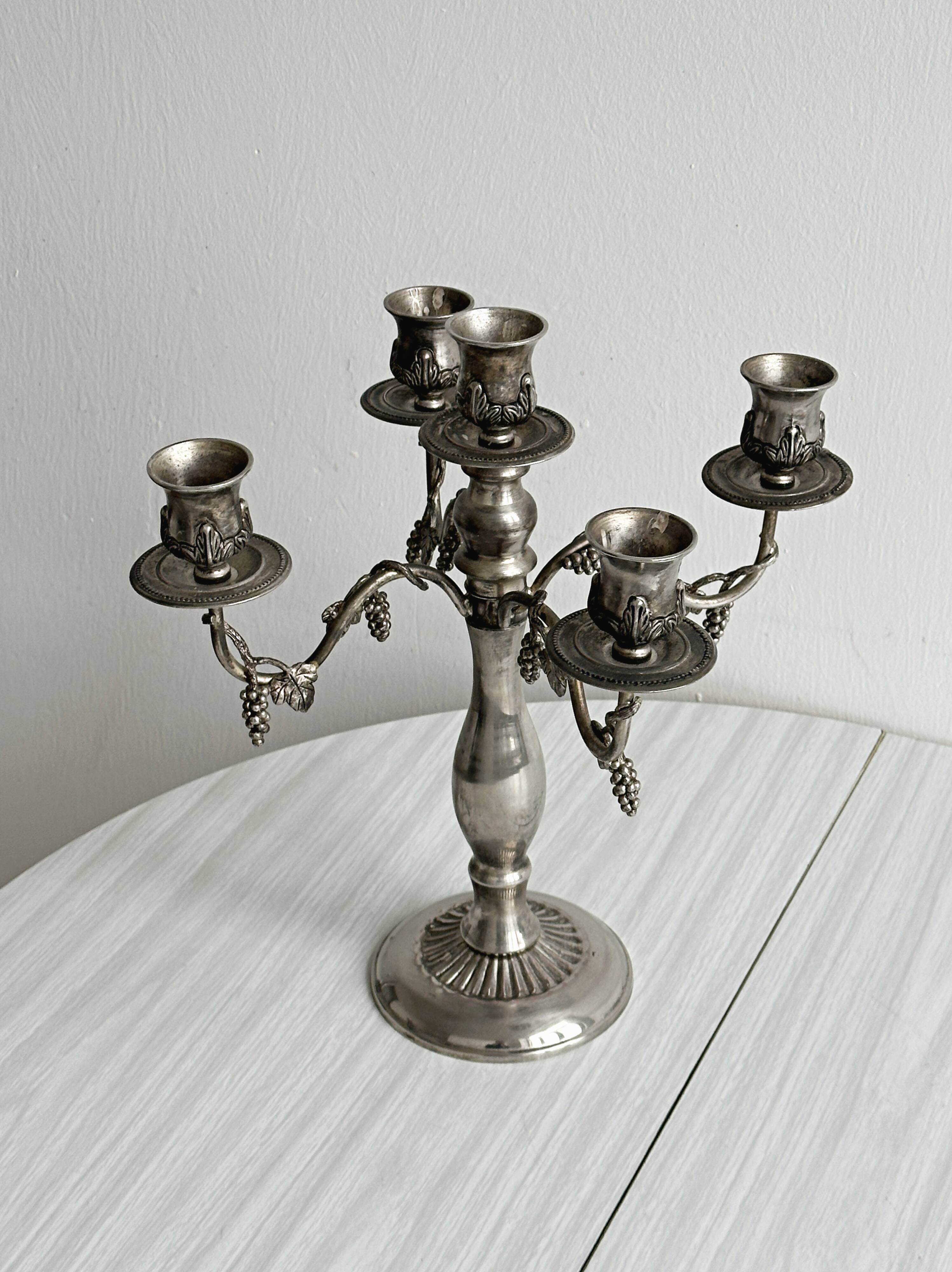Chandelier, antique 5-branch metal candlestick.