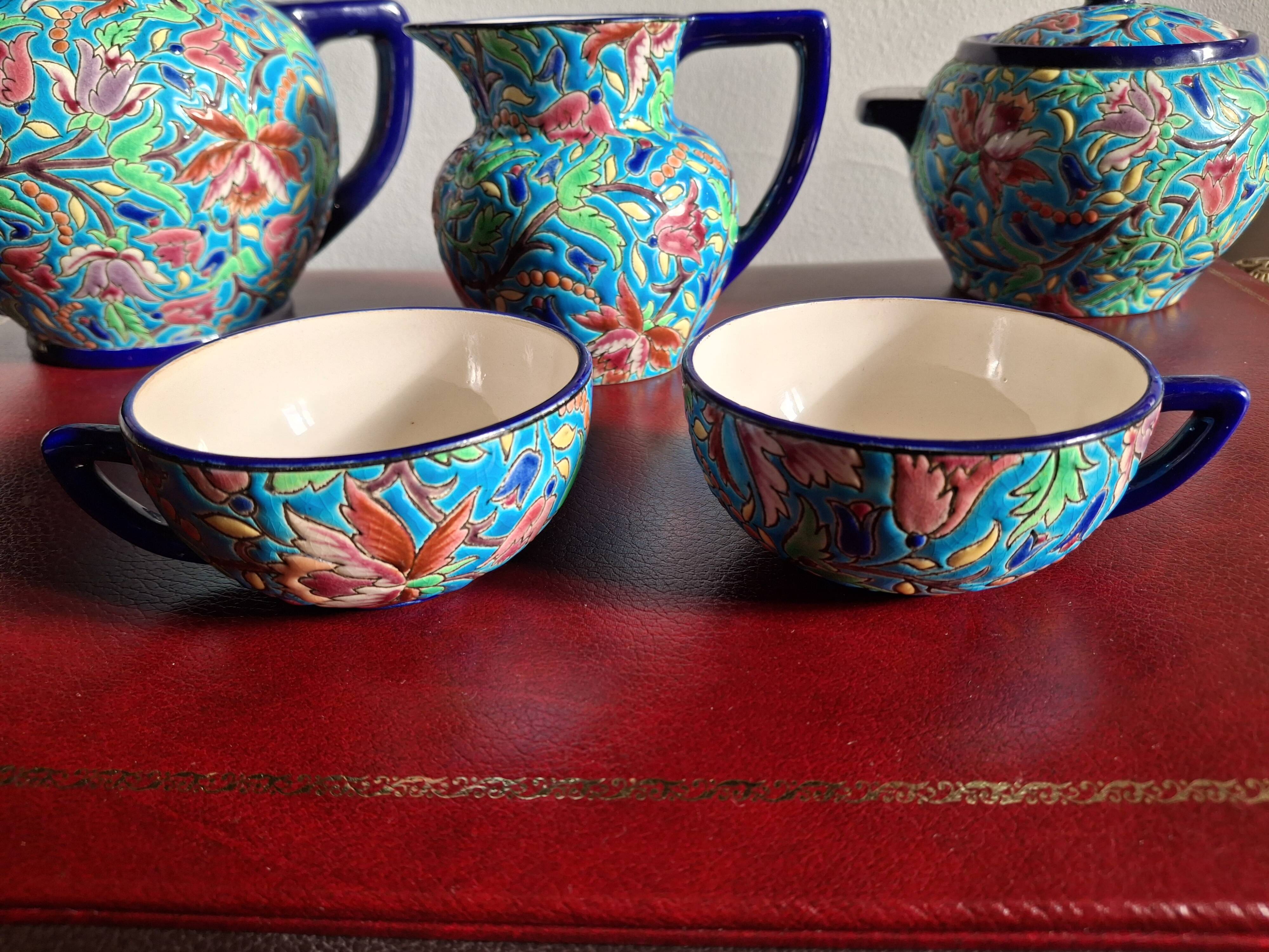 Cloisonné enamel tea service from Longwy in excellent condition.