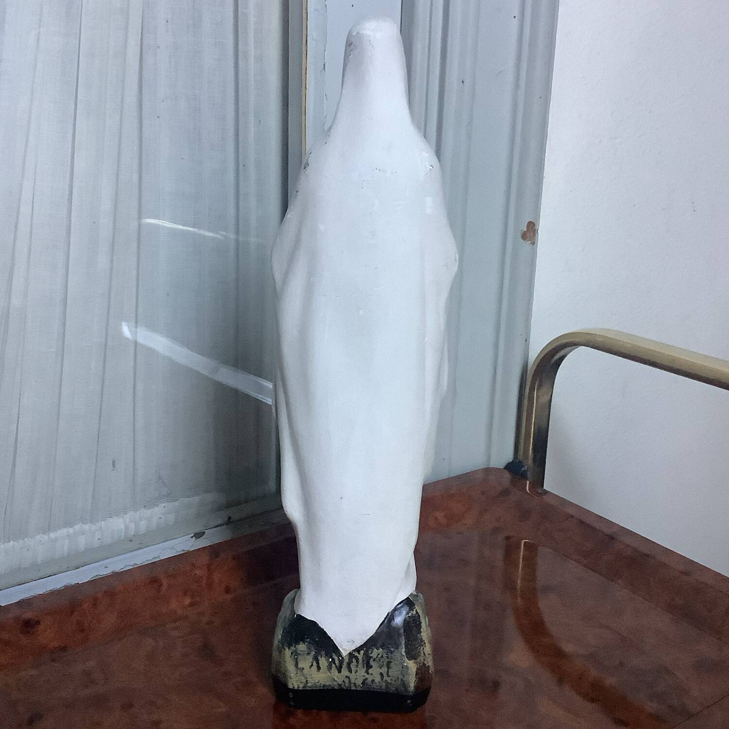 Small plaster statue of the Virgin Mary