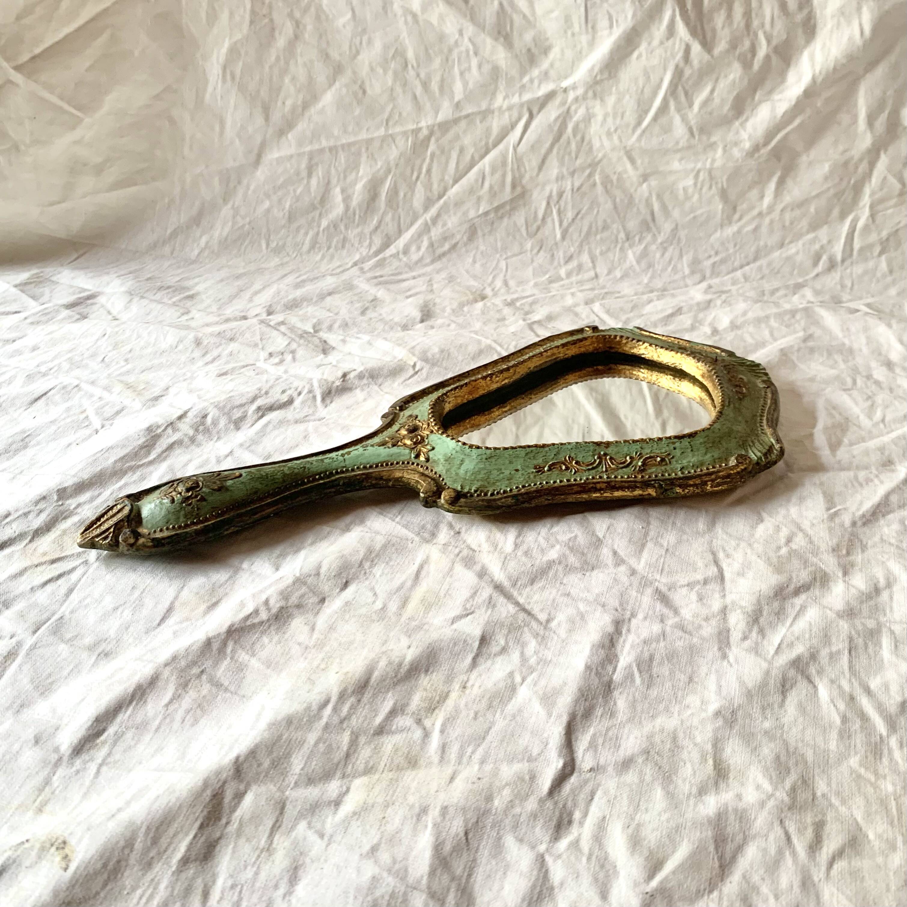 Old Florentine style carved wooden hand mirror