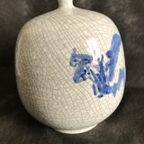 Vase boule à col pincé aplati