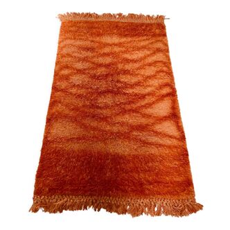 Orange wool carpet