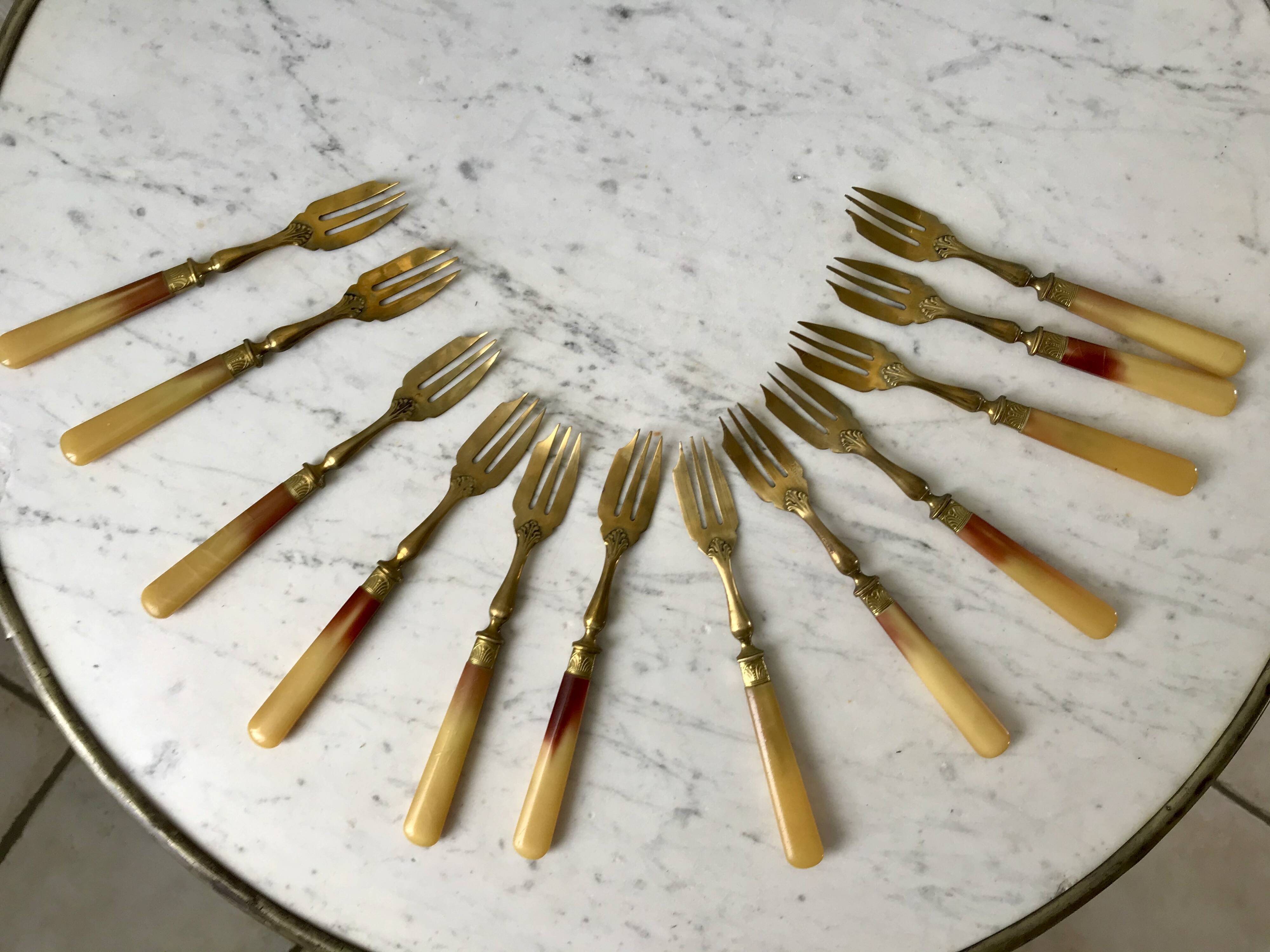 set of 12 horn dessert forks from the 50s