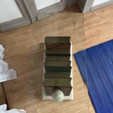 Vintage glass coffee table with trompe-l'oeil book base