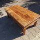 Medieval-inspired red oak coffee table with ironwork