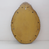 Renaissance oval mirror with bird