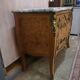 Commode galbée en loupe d'orme et bronze