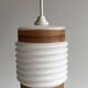 Opaline corrugated tube suspension