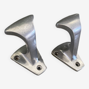 Pair of cast aluminum coat hooks