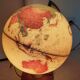 Vintage globe with ancient cartography