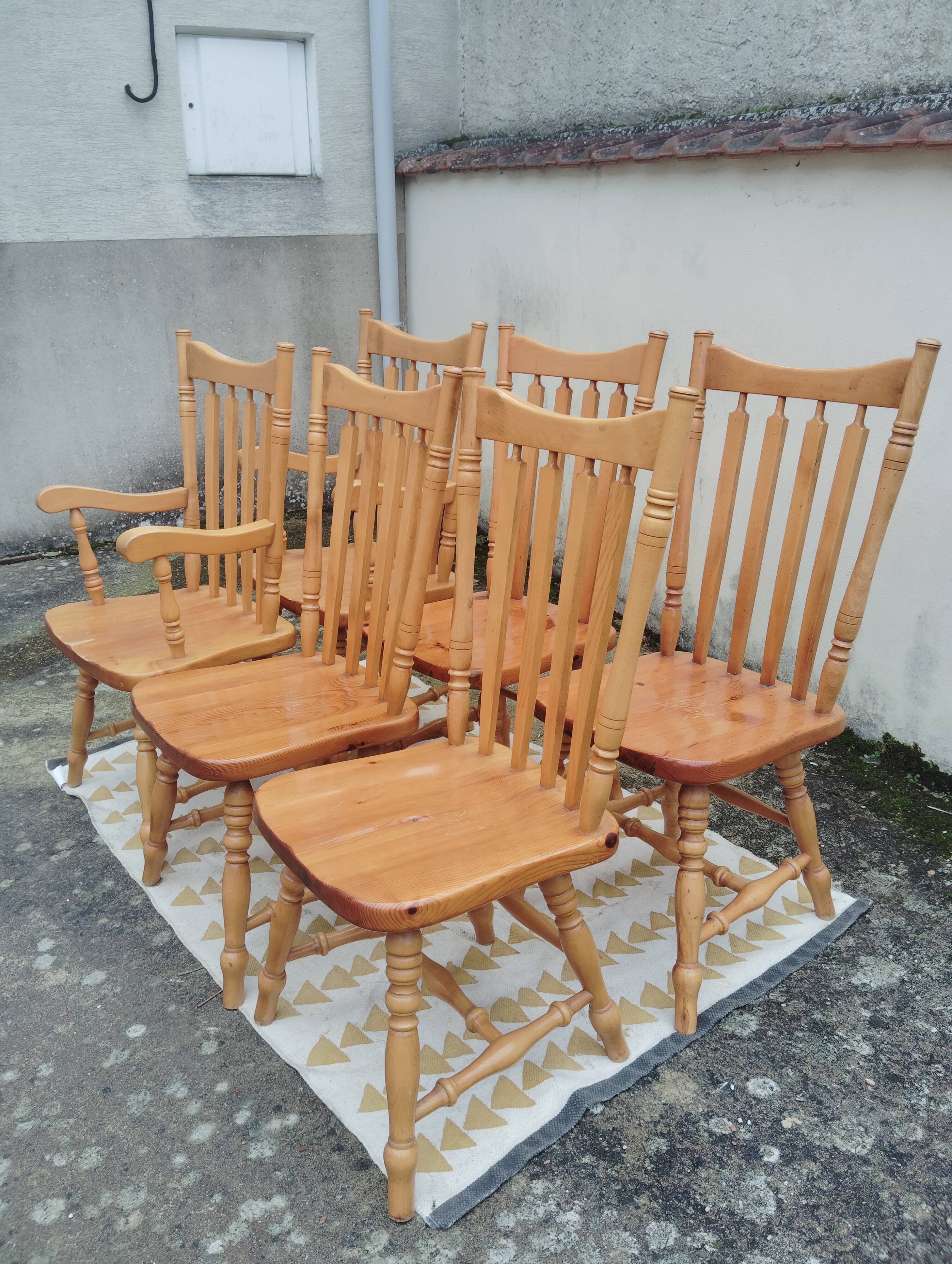 Set of 6 western bistro chairs, including 2 with armrests.