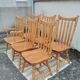 Set of 6 western bistro chairs, including 2 with armrests.