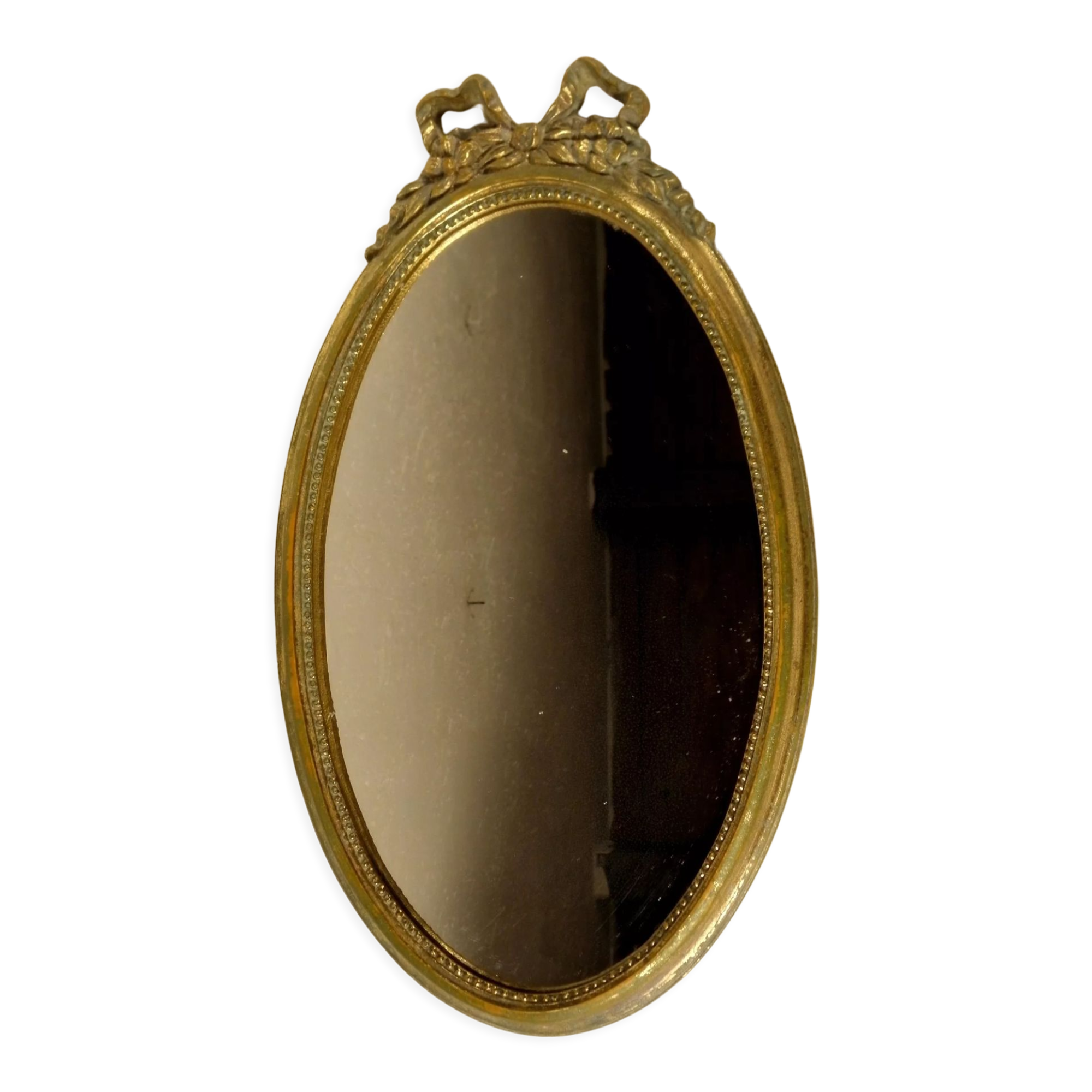Golden oval mirror