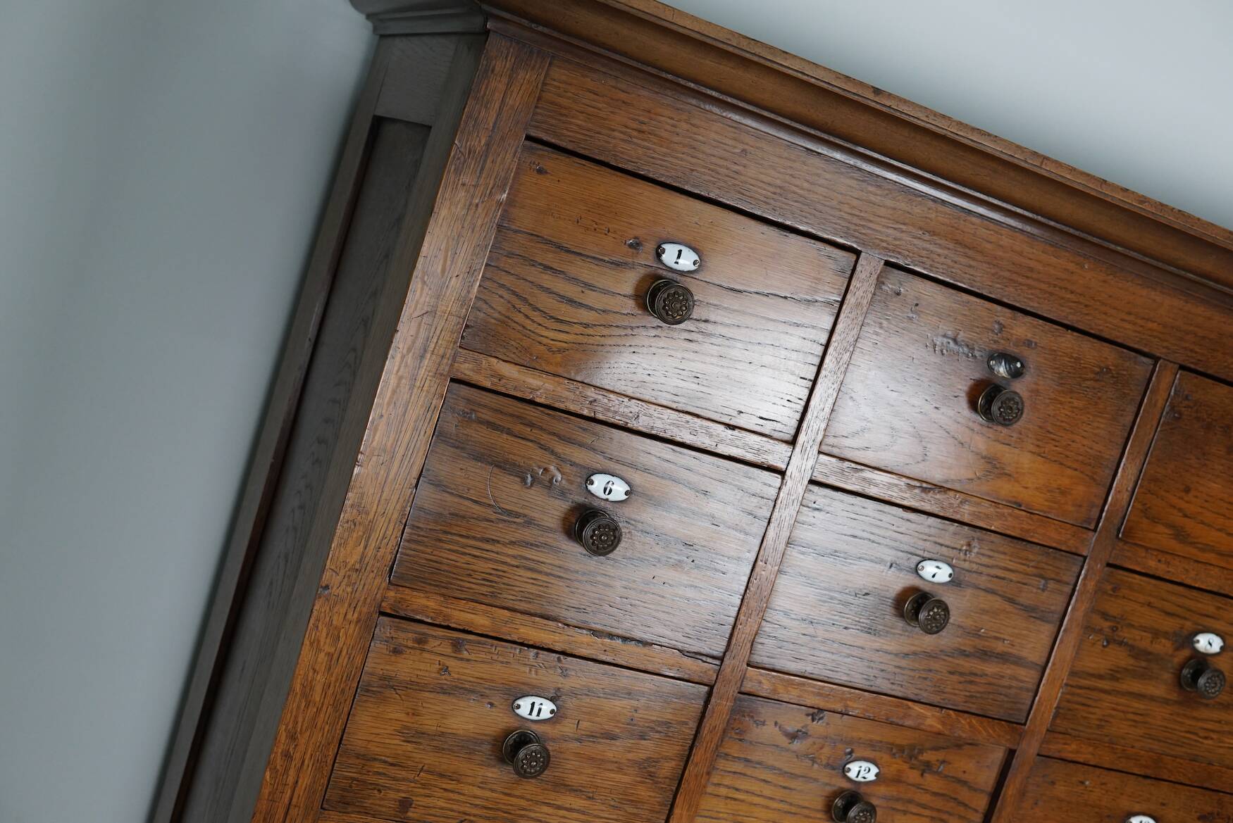 Large dutch oak apothecary cabinet / barber cabinet with enamel shields, 1900s