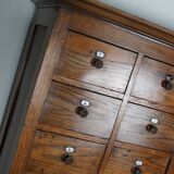 Large dutch oak apothecary cabinet / barber cabinet with enamel shields, 1900s