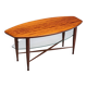 Assymetrical coffeetable with glass storage and cross leg details
