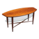 Assymetrical coffeetable with glass storage and cross leg details