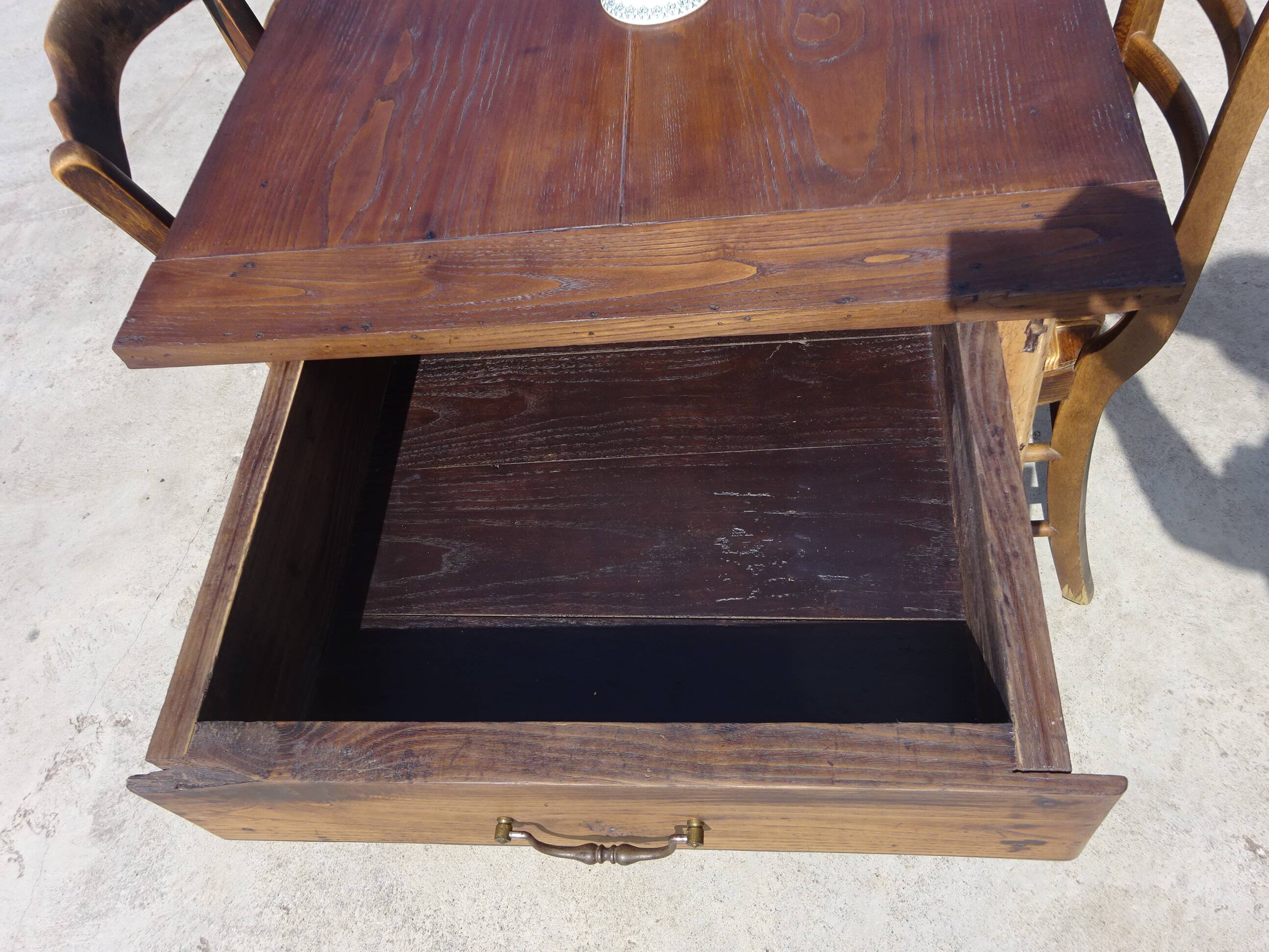 Old farmhouse table made entirely of restored solid oak.