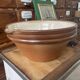 Antique spouted jug in terracotta