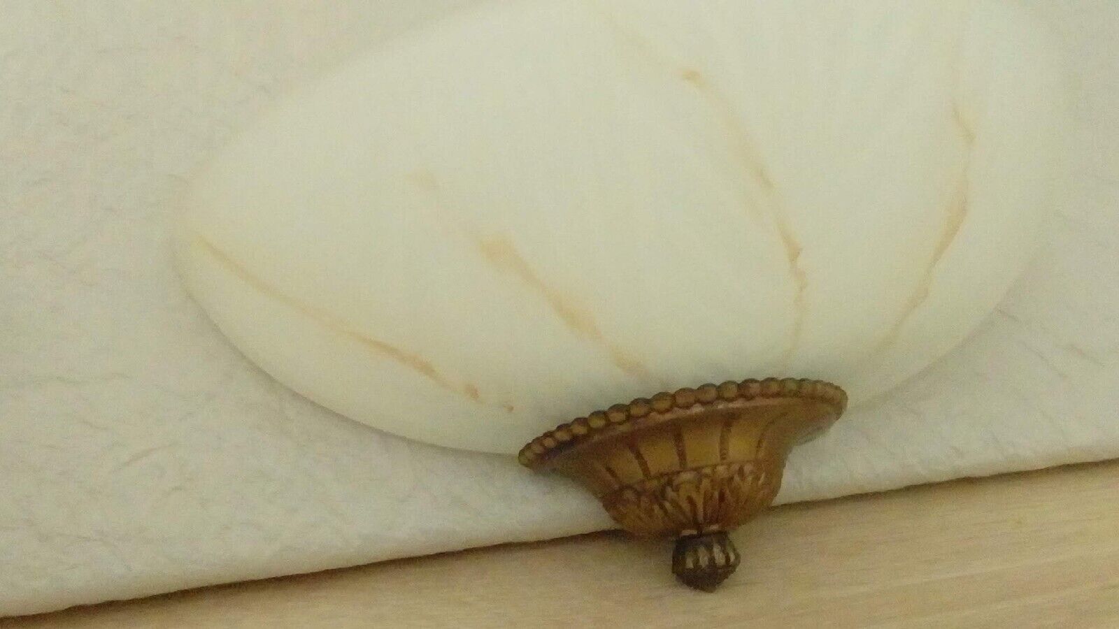 Pair of wall sconces in glass paste and brass