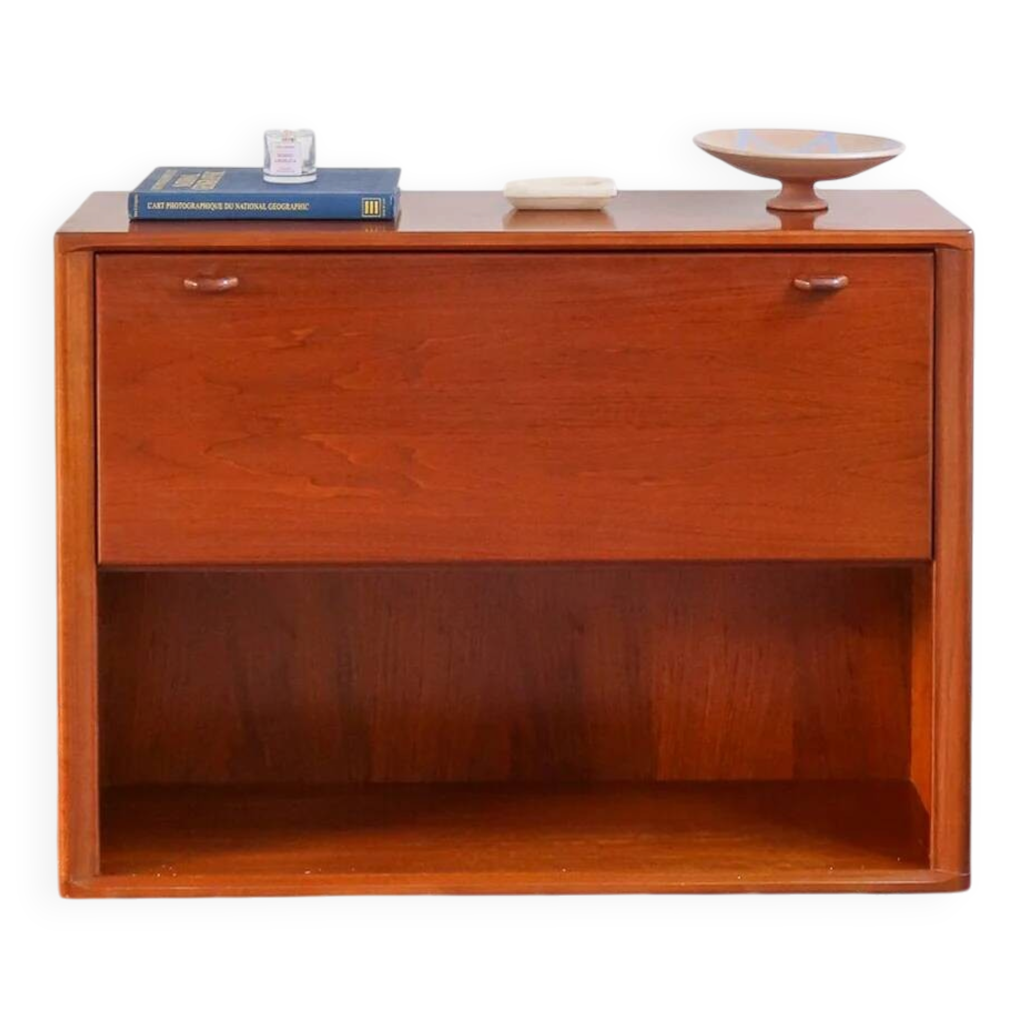 Vintage teak bar cabinet with black glass interior.
